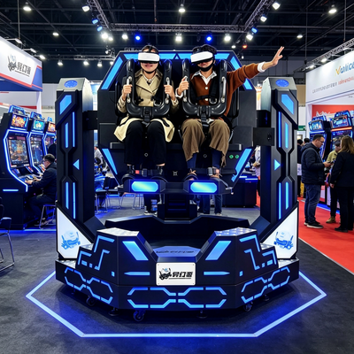 Εξοπλισμός VR Arcade με το κλειδί στο χέρι Εμπορικός Περιστρεφόμενη 1080 Μοίρες 9D VR Κινηματογραφική Καρέκλα Κίνησης Διπλού Παίκτη Προσομοιωτής Τροχαλίας